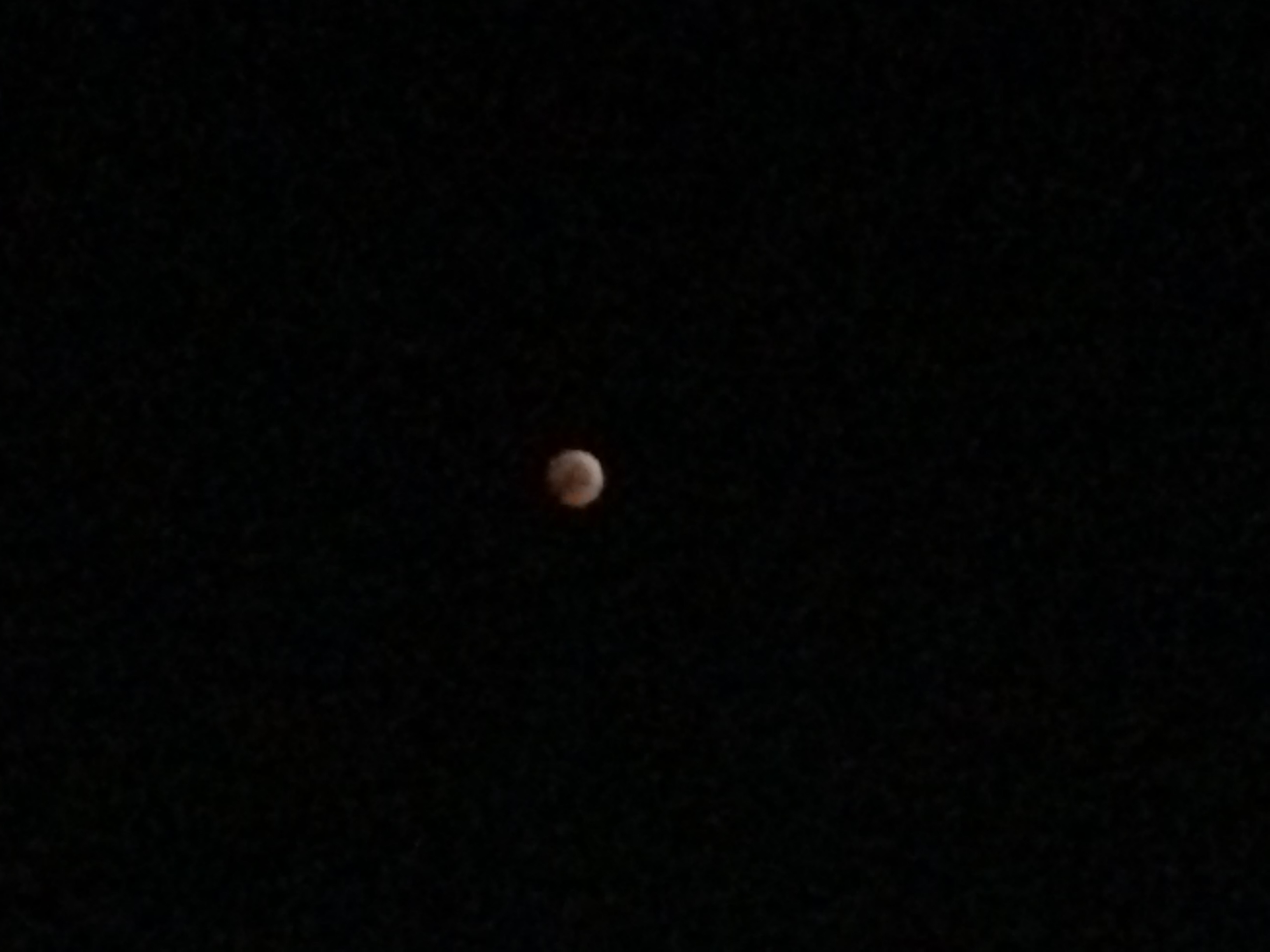 Full lunar eclipse - moon in earth's blood red shadow